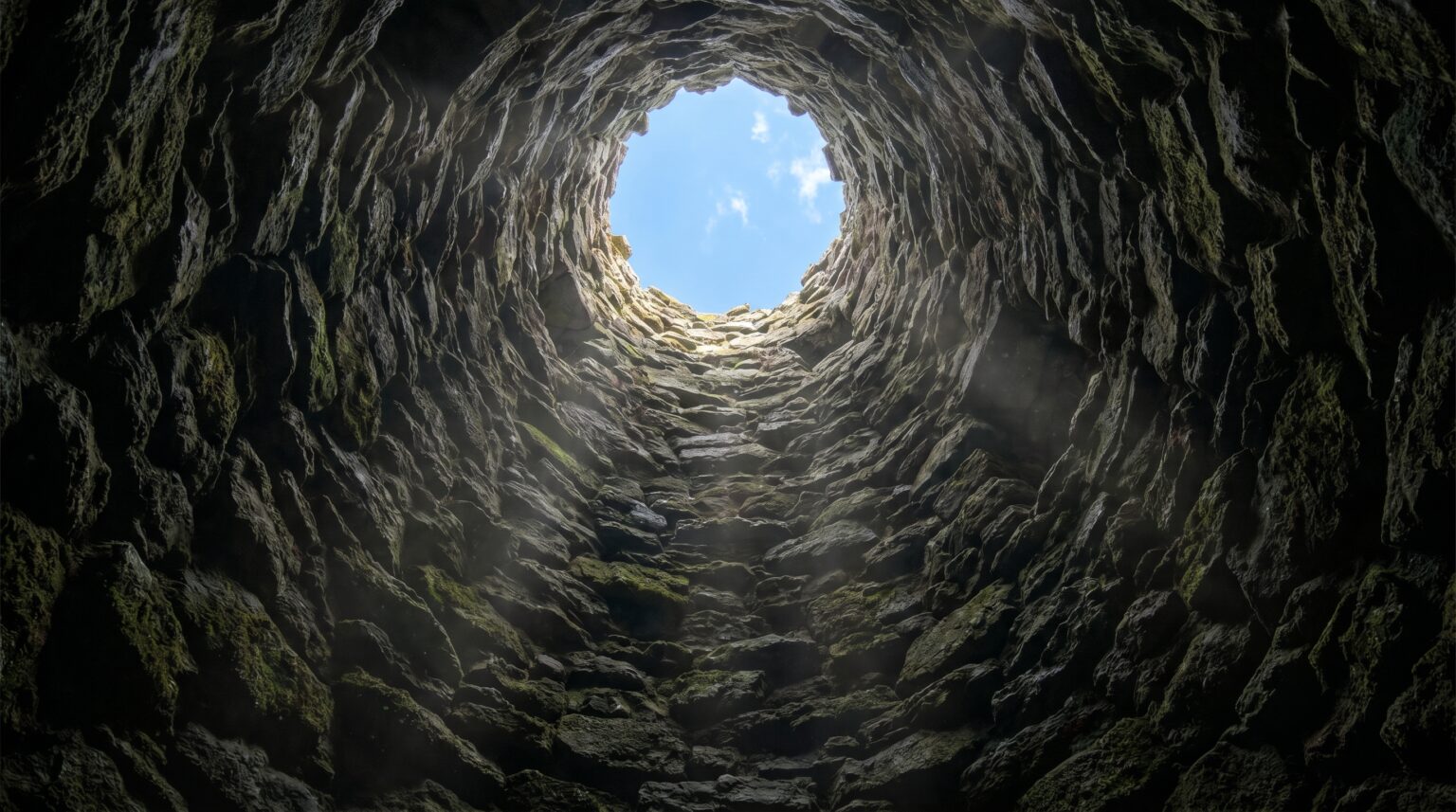 Looking up a massive vertical ventilation shaft from the bottom of the Derinkuyu Underground City