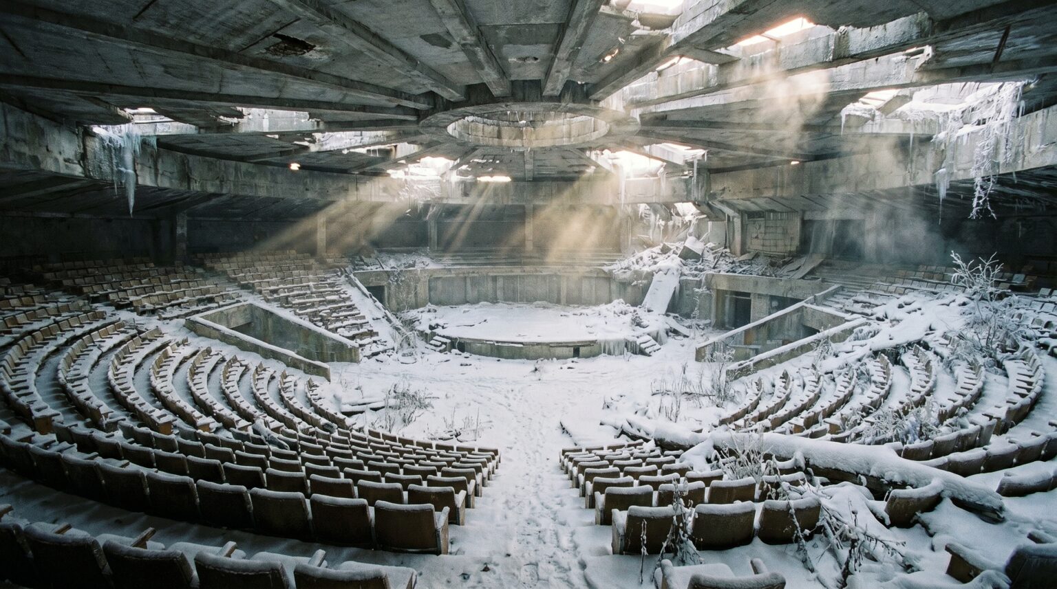 The destroyed and snow-filled grand amphitheater inside the Communist UFO Bulgaria.
